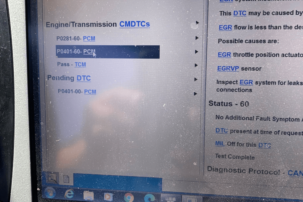 Diagnostic trouble codes. Check engine light in Chino, CA by Domestic Diesel & Auto Service. Close-up of a scan tool screen showing PCM codes P0281 and P0401, indicating potential issues with EGR flow and cylinder contribution balance.